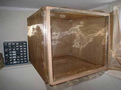 A faraday cage made of fine copper mesh with the frame.