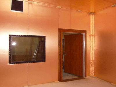 A faraday cage laboratory made of copper mesh with elegant appearance and has window and door.