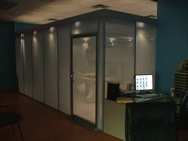 A MRI room and a computer outside of the room
